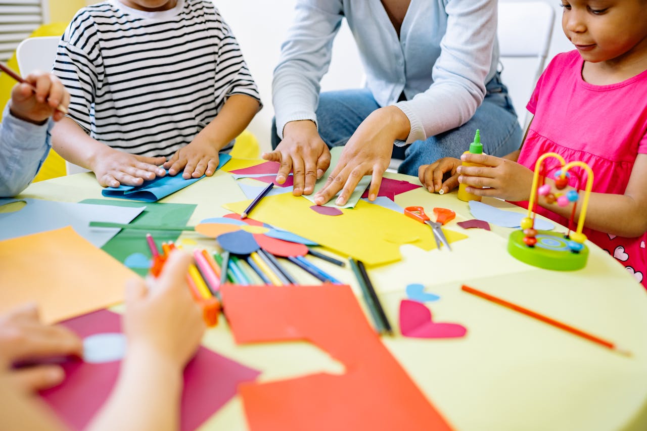Crafting Captivating Headlines: Your awesome post title goes here Group of diverse children enjoying creative art activities in a vibrant classroom setting.